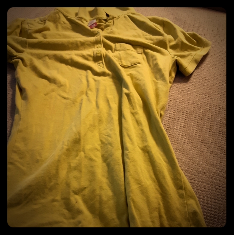 Greenish yellow shirt.